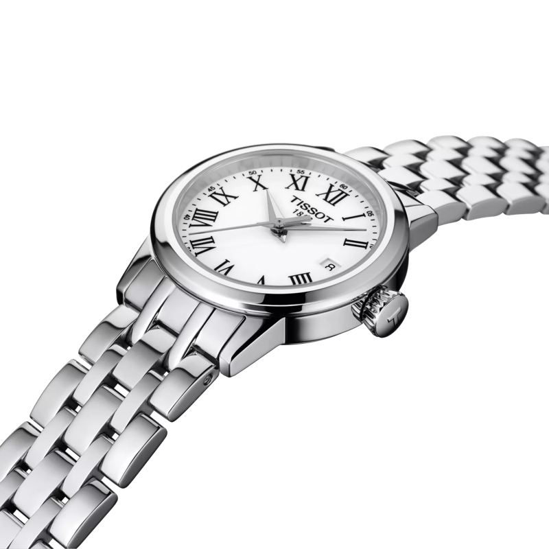 Elegant Tissot Ladies Dream watch featuring a steel bracelet, white dial with Roman numerals. Timepiece details.