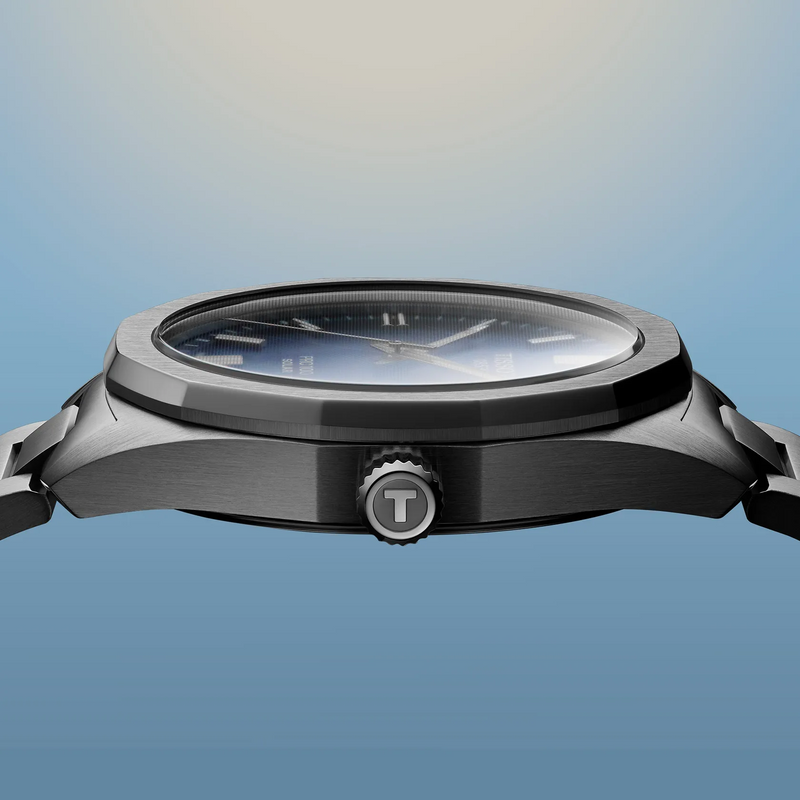 The Mens Tissot PRC100 Solar Quartz, a blue dial stainless steel bracelet watch from Tissot, available at OD’s Jewellers in St Helens