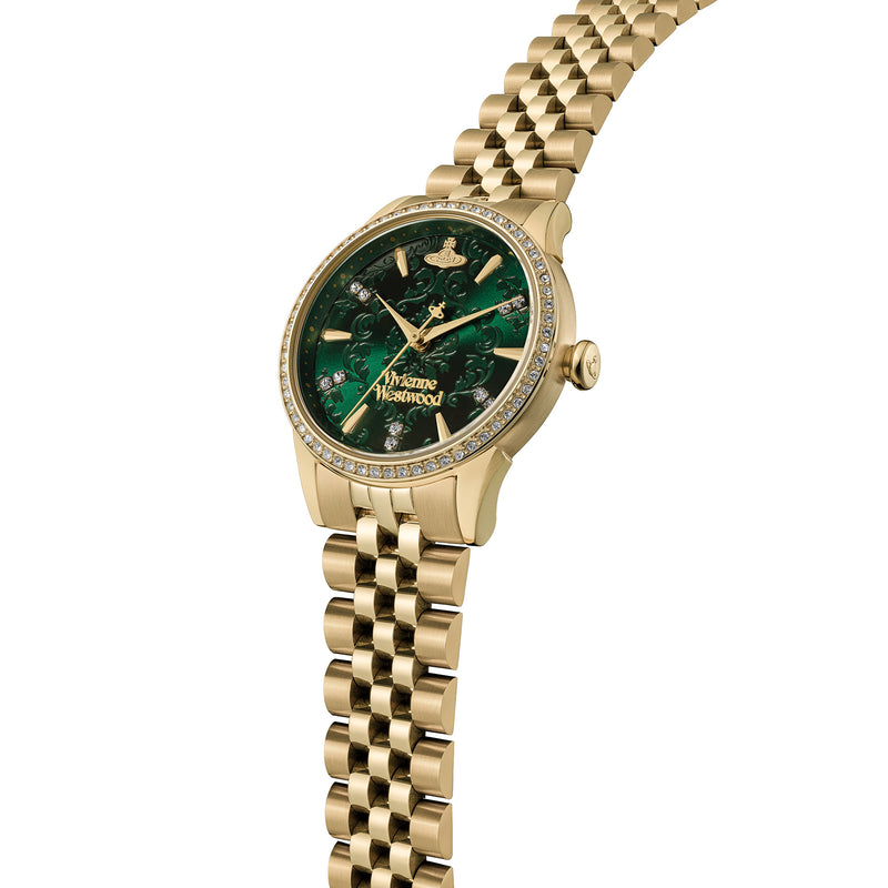 Close-up of the Vivienne Westwood Wallace watch. Gold-plated bracelet, green dial with orb logo, and crystal accents.