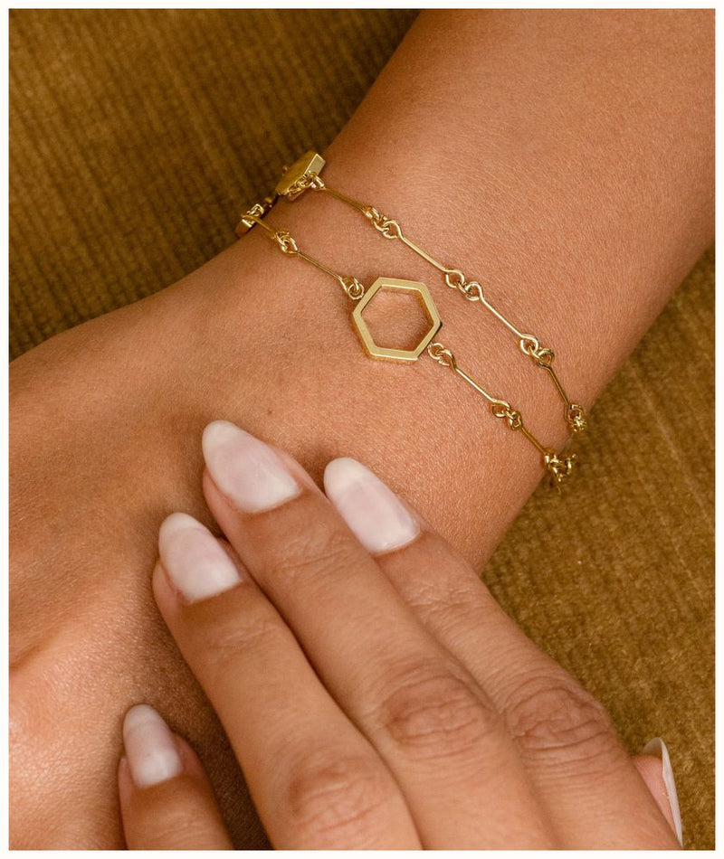 The Olivia Burton Honeycomb Double Layered Bracelet, a gold plated stainless steel bracelet from Olivia Burton, at OD’s Jewellers in St Helens.