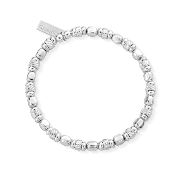 The ChloBo Twisted Cube Bracelet, a silver metal bracelet from ChloBo, available at OD’s Jewellers in St Helens.