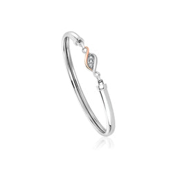 The Clogau Past Present Future Bangle with White Topaz, a silver bracelet from Clogau, available at OD’s Jewellers in St Helens.